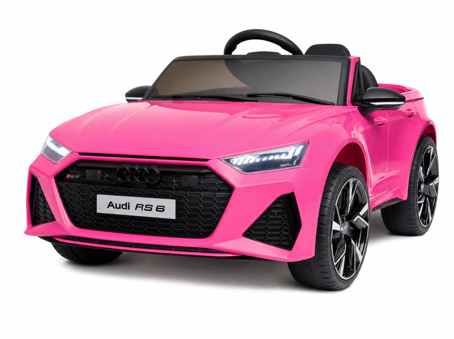 Audi RS6 enfant électrique 12V rose poudré, vue trois-quarts avant